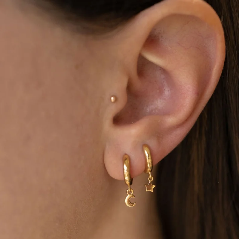 Star and Moon Huggie Hoop Earrings in Gold